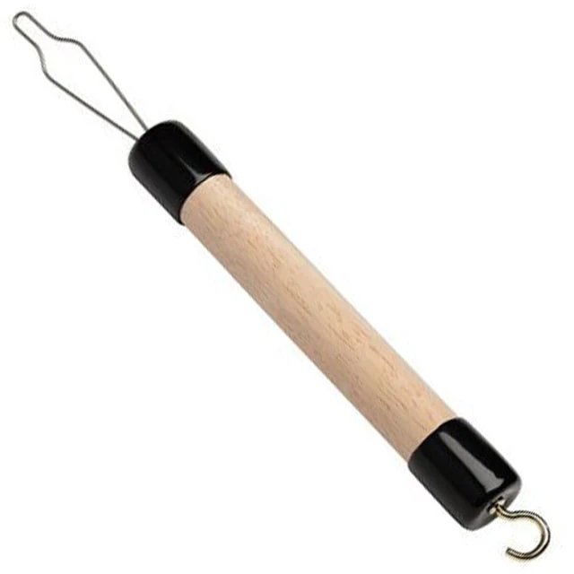 Haken zum Knöpfen und Reißverschlüsse hochziehen