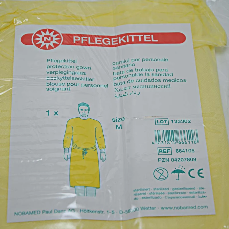 Pflegekittel aus Vliesstoff von Noba, gelb, Größe M, 1 Stück