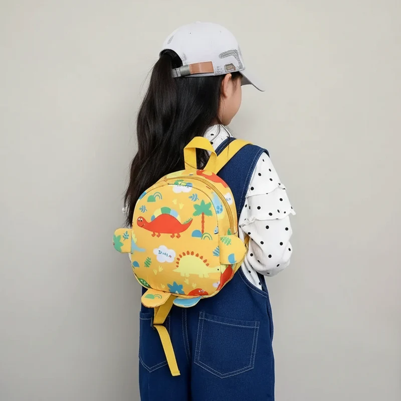 Camp Basel | DinoTote Süsser Cartoon-Dinosaurier-Rucksack