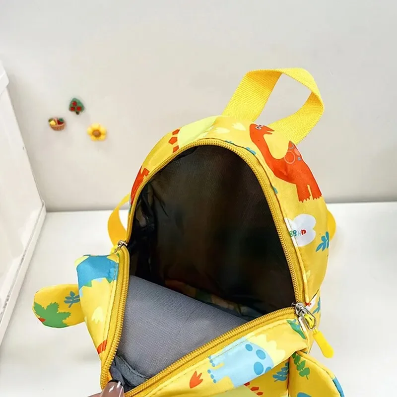 Camp Basel | DinoTote Süsser Cartoon-Dinosaurier-Rucksack