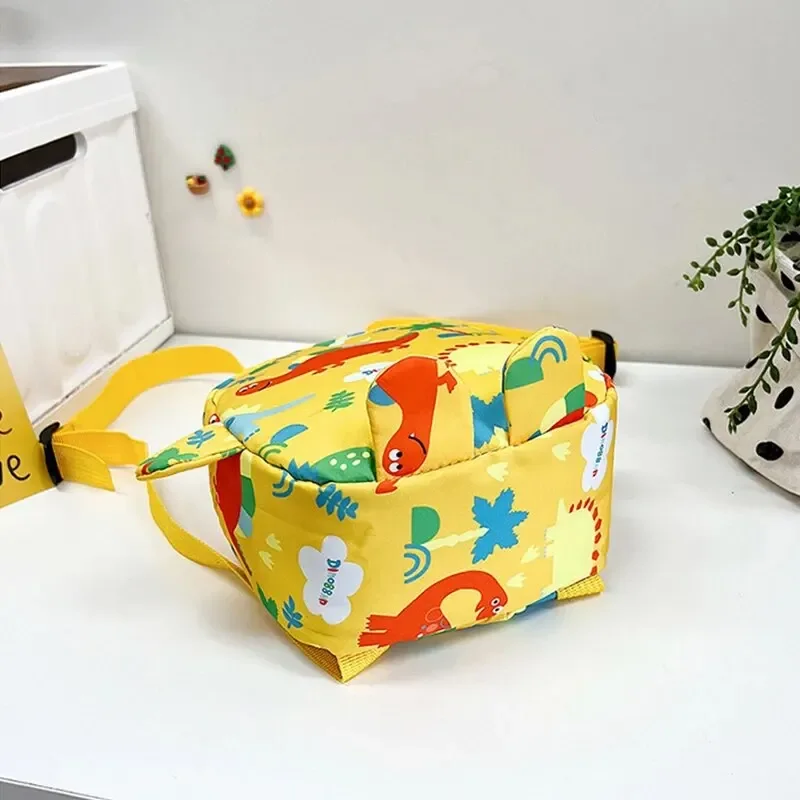 Camp Basel | DinoTote Süsser Cartoon-Dinosaurier-Rucksack