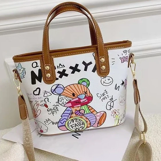 Kreative Handtasche im farbenfrohen Kunststil Skanto