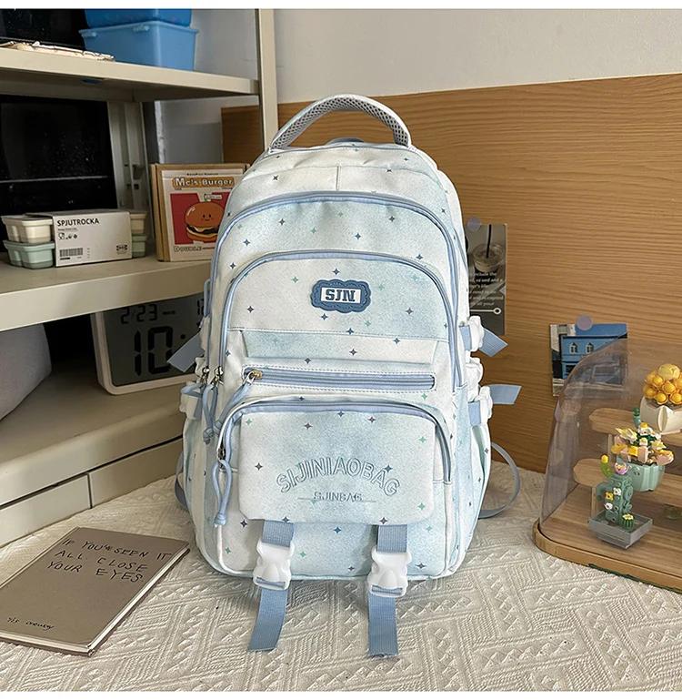 Schulrucksack mit Galaxie-Design und vielen Fächern