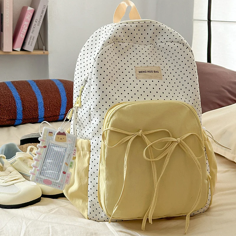 Minimalistischer gepunkteter Schulrucksack