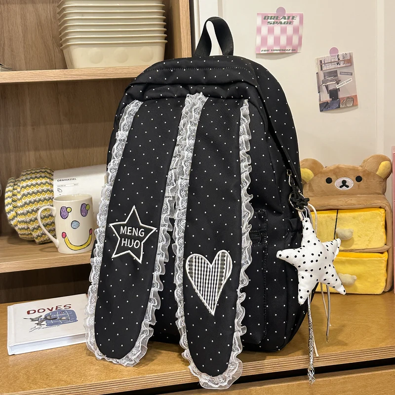 Dekorative Schultasche mit Spitzenbesatz
