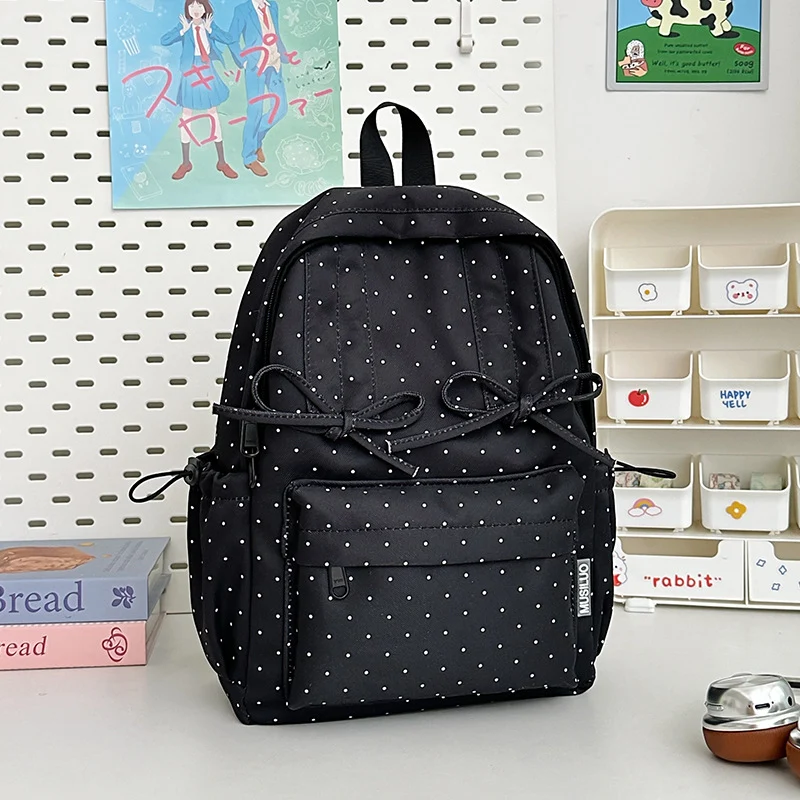 Niedlicher Studentenrucksack mit Tupfen