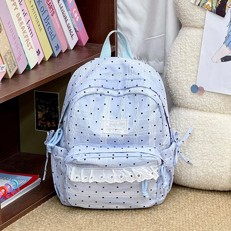 Charmante Schultasche mit Tupfenmuster und Spitzenbesatz
