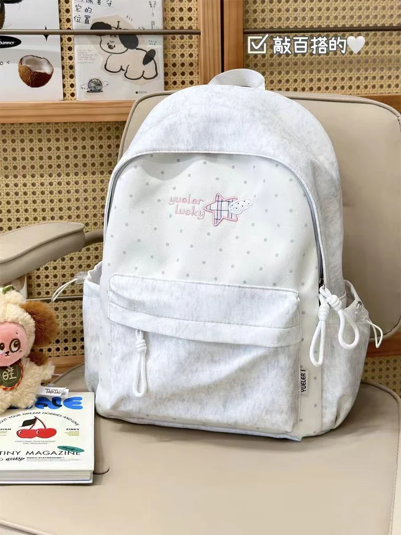 Charmanter lässiger Schulrucksack