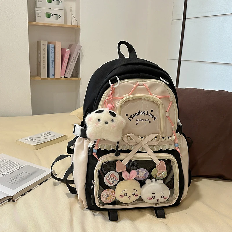 Niedlicher Schulrucksack mit mehreren Taschen und Charakter-Motiv