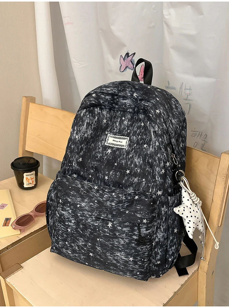 Vielseitige Schultasche mit Sternenprint