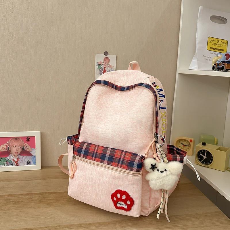 Lässiger karierter Schulrucksack