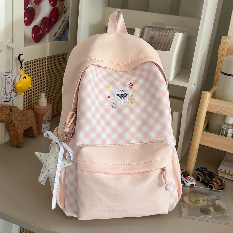 Lustiger gemusterter Schulrucksack