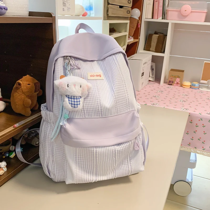 Vielseitiger karierter Schulrucksack