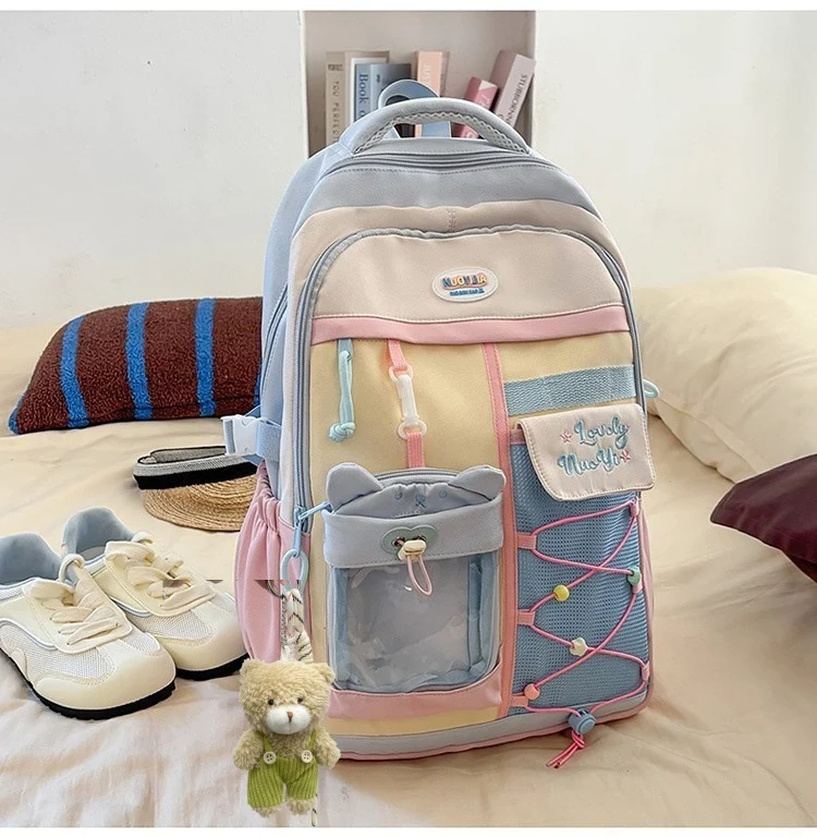 Schulrucksack mit Farbblock-Design und mehreren Taschen