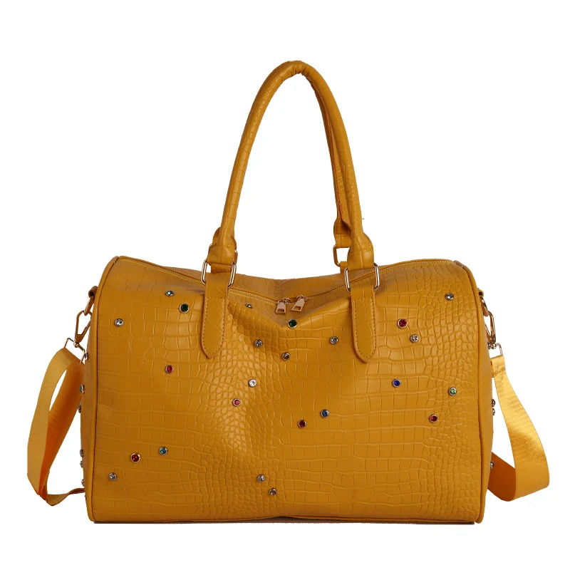 Elegante Handtasche mit luxuriösem Krokoprägung und farbigen Applikationen Skanto
