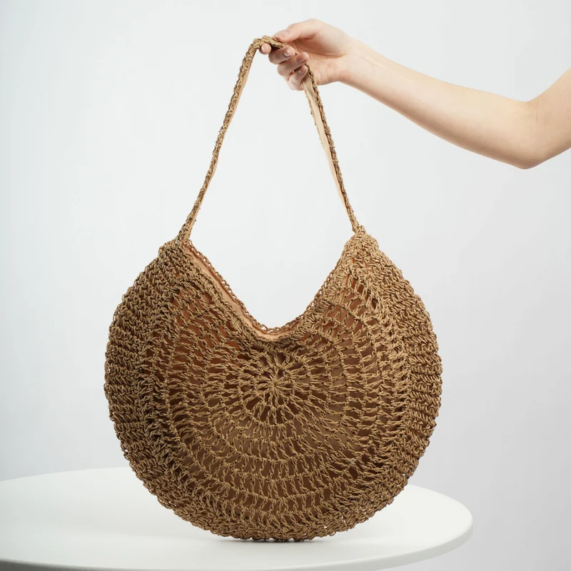 Handgefertigte runde Tasche Skanto
