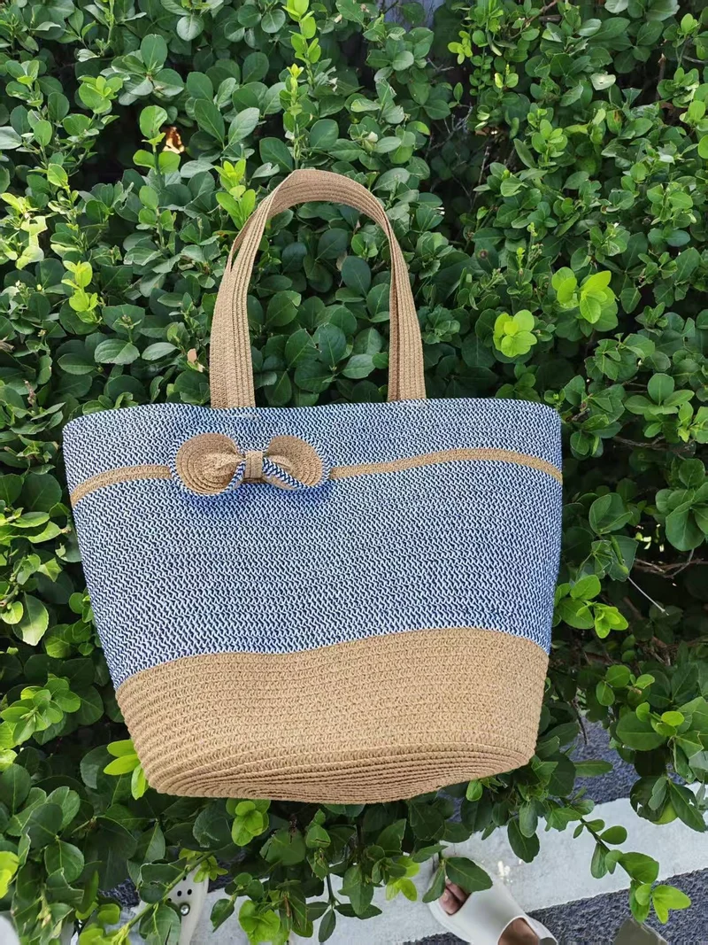Elegante Strohtasche mit dekorativem Schleifenverschluss Skanto