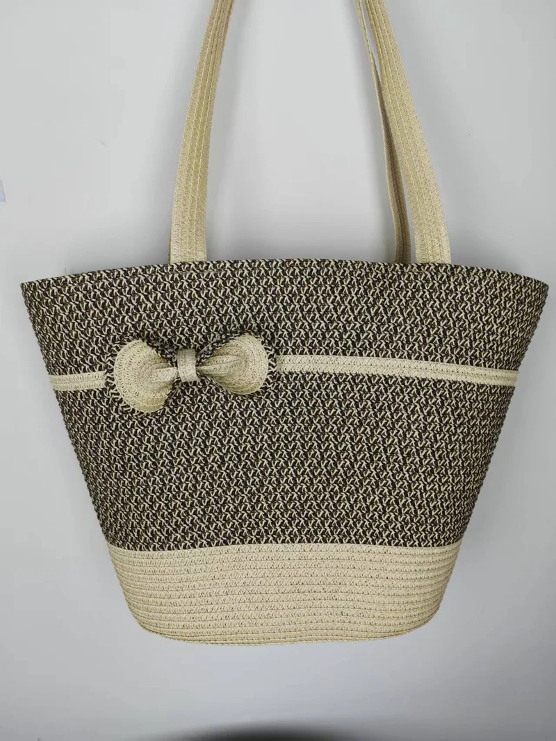 Elegante Strohtasche mit dekorativem Schleifenverschluss Skanto