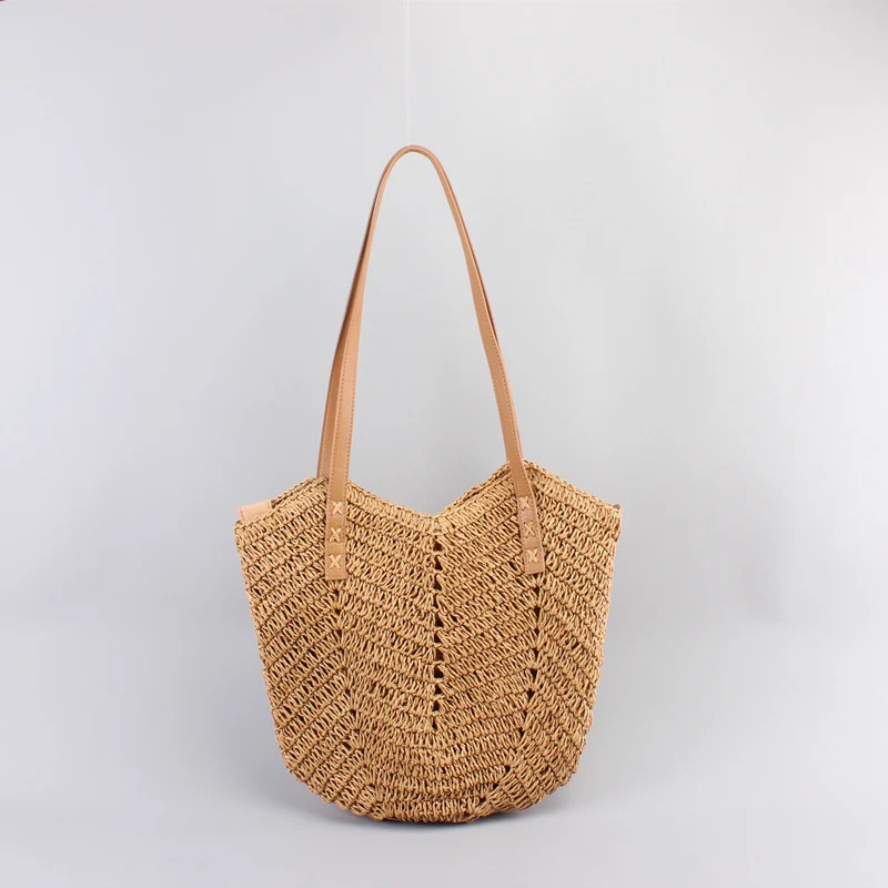 Freizeittaschen aus handgewebtem Raffia mit breiten Ledergriffen Skanto