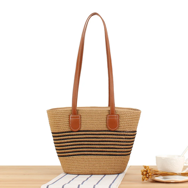 Handtasche aus hochwertigem Bast mit eleganten Ledergriffen Skanto