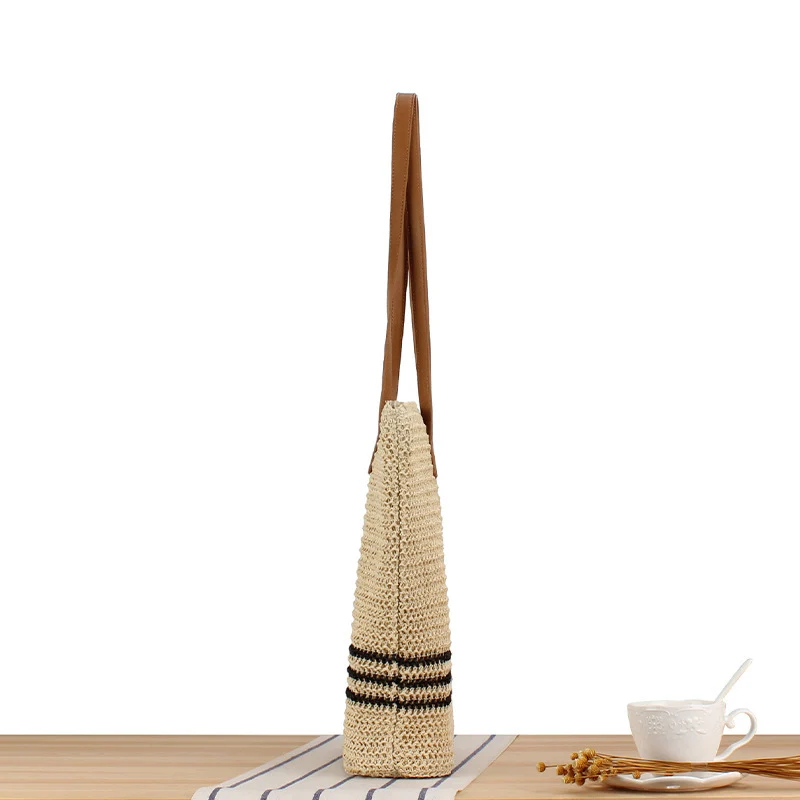 Stylische Strandtasche aus Naturgeflecht mit Ledergriffen Skanto