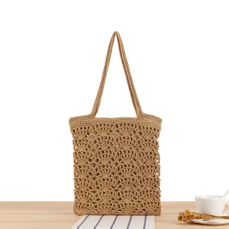 Handtasche aus handgeknüpftem Naturmaterial mit eleganten Details Skanto