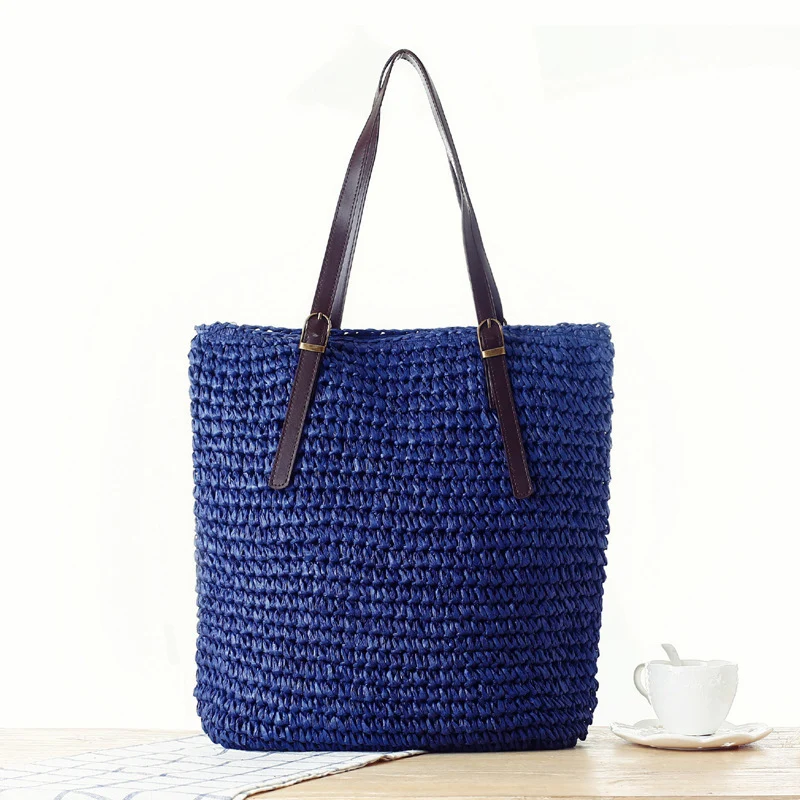 Handtasche aus handgefertigtem Naturmaterial mit robusten Ledergriffen Skanto