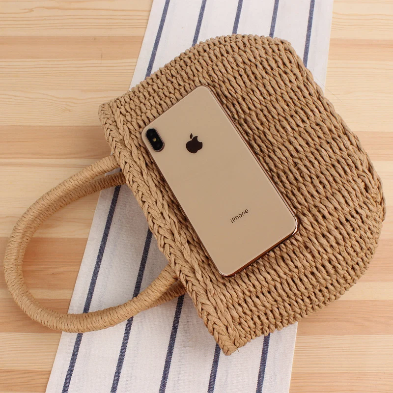 Handtasche aus geflochtenem Naturmaterial mit modernen Details Skanto