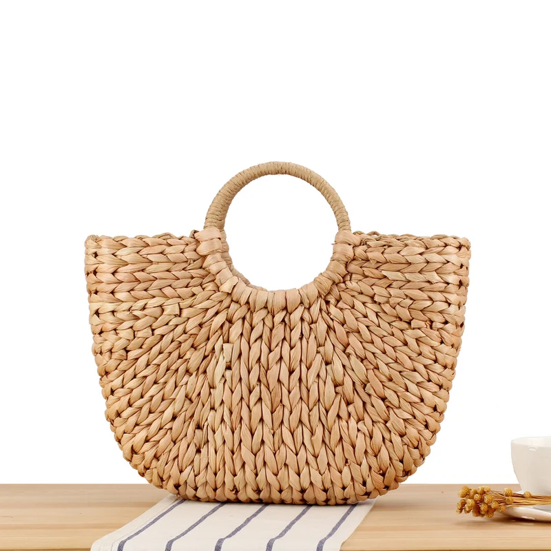 Gewebte Naturmaterial-Handtasche mit elegantem Rundgriff Skanto