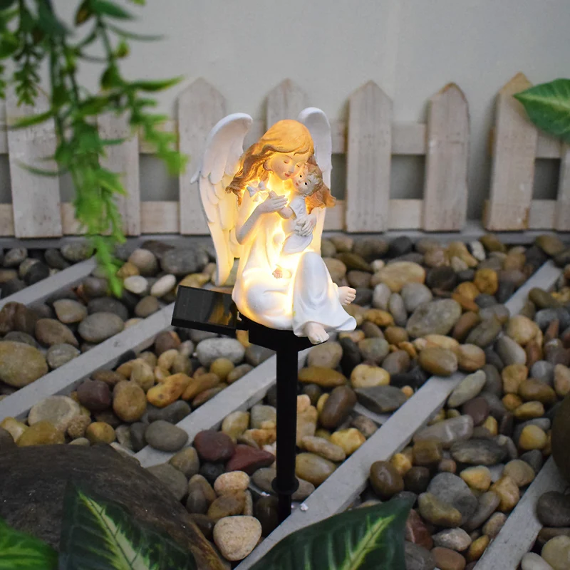 Dekorative Solar-Gartenstecker-Statue, Mädchenfigur aus Harz mit integrierter Solar-LED und wetterfestem Erdspieß Skanto