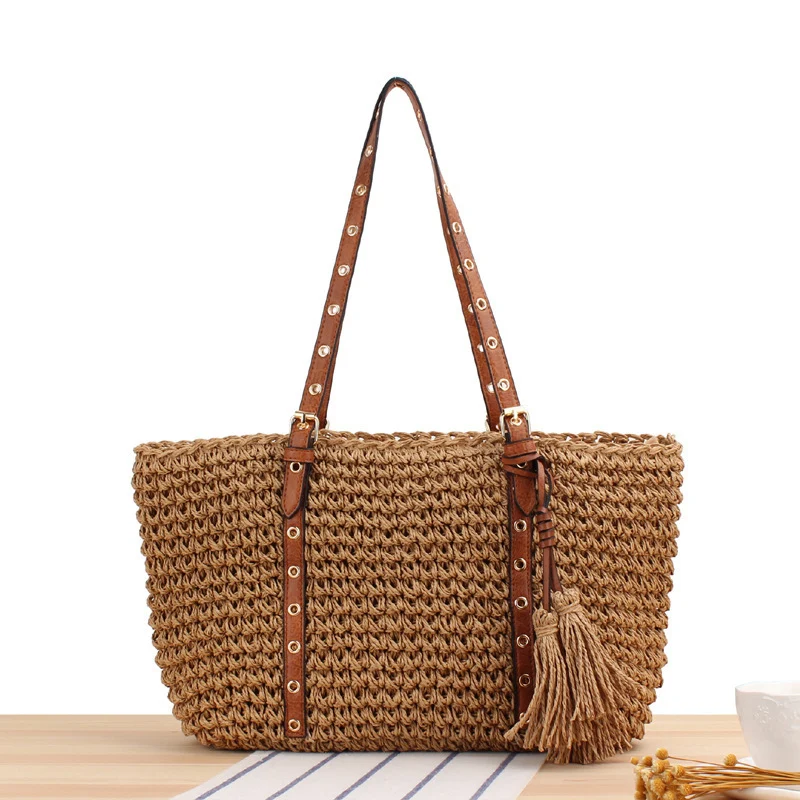 Elegante Strandtasche aus handgefertigtem Naturmaterial mit Lederakzenten Skanto