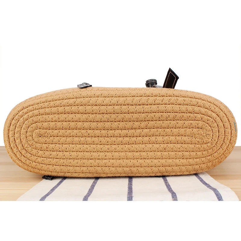 Elegante Strandtasche aus gewebtem Naturmaterial mit stilvollen Lederakzenten Skanto