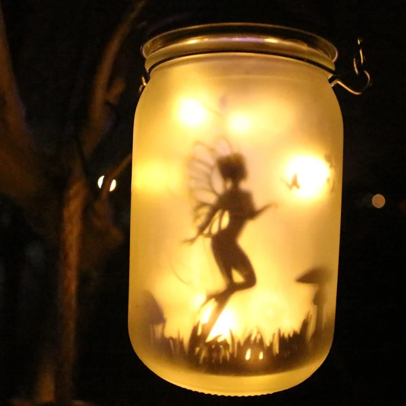 Solarbetriebene Milchglas-Feen-Silhouette-Mason-Jar-Laterne mit mehrfarbiger LED Skanto
