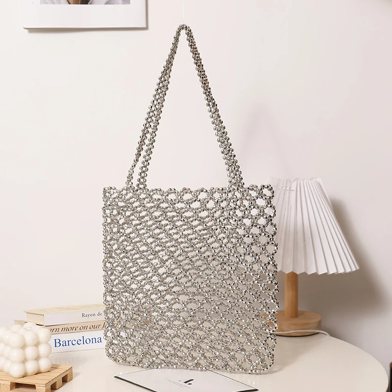 Glitzernde Netztasche aus geflochtenem Material Skanto
