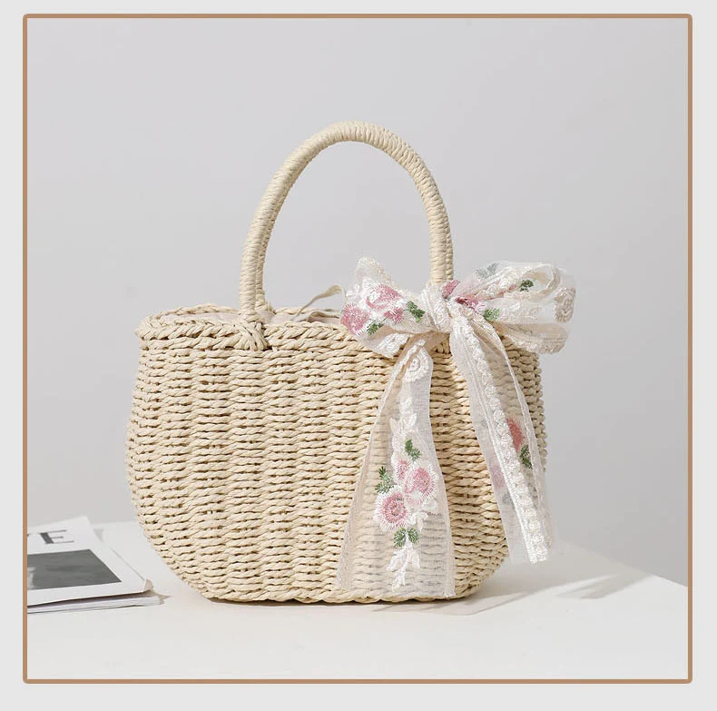 Elegante Strohtasche mit Blumen-Schleifendetail Skanto