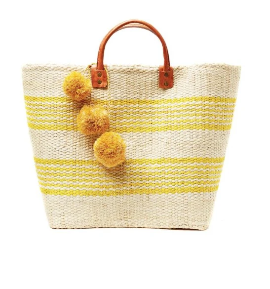 Stylische Strohtasche mit verspielten Pompons Skanto