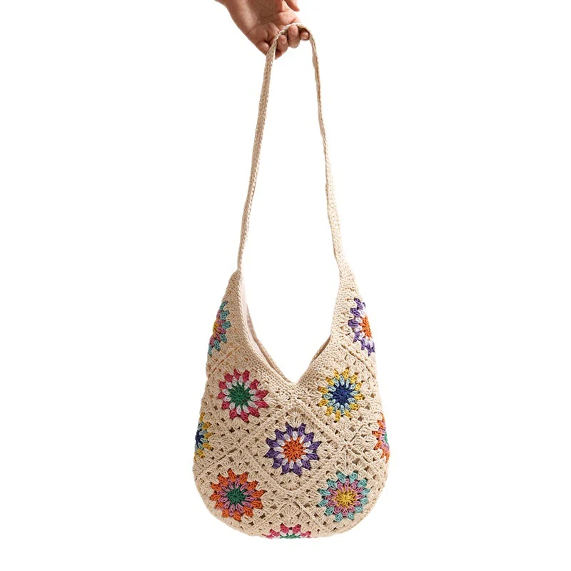 Handgemachte gehäkelte Tasche mit buntem Blumenmuster Skanto