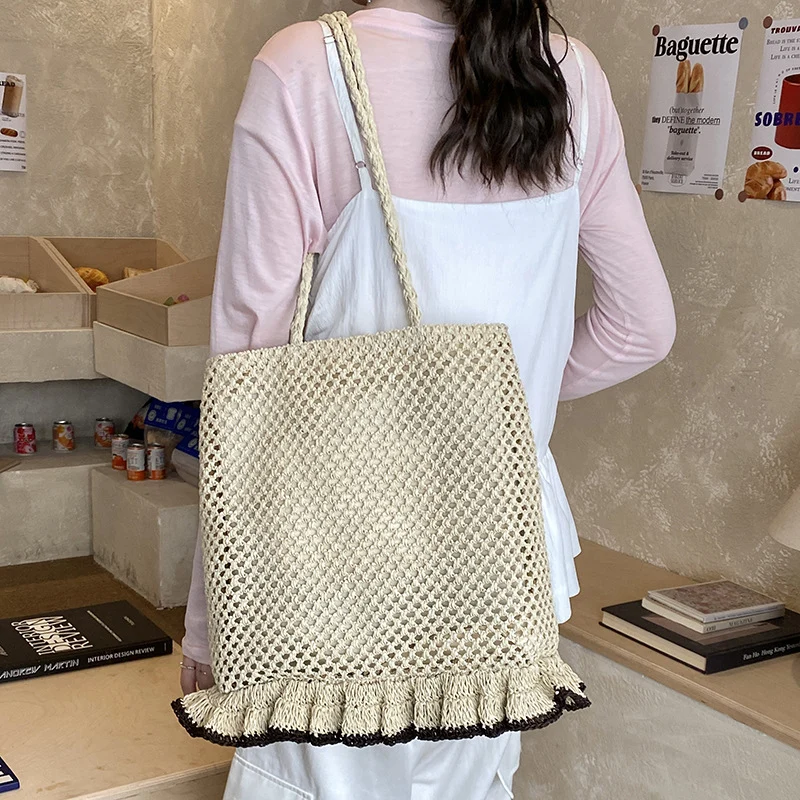 Handgefertigte Strohtasche mit Fransenrand Skanto