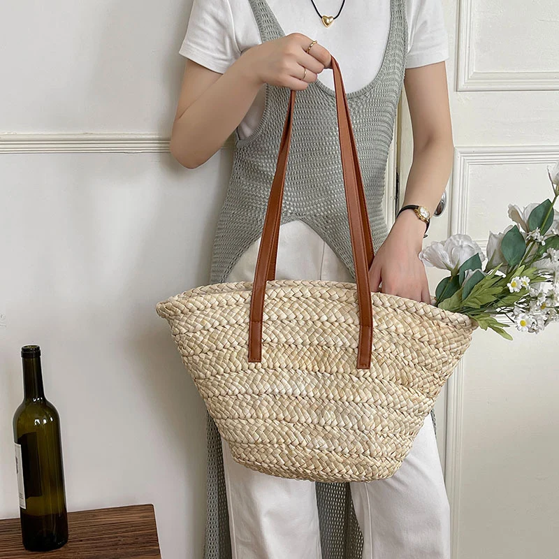 Elegante gewebte Tasche mit langen Lederriemen Skanto