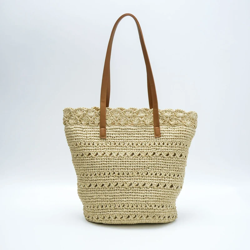 Handgewebte Tragetasche mit floralen Details Skanto