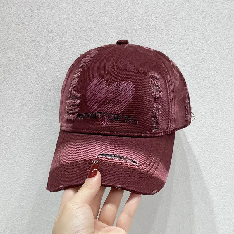 Damen Baseballkappe im Used-Look mit Herzstickerei, Skanto