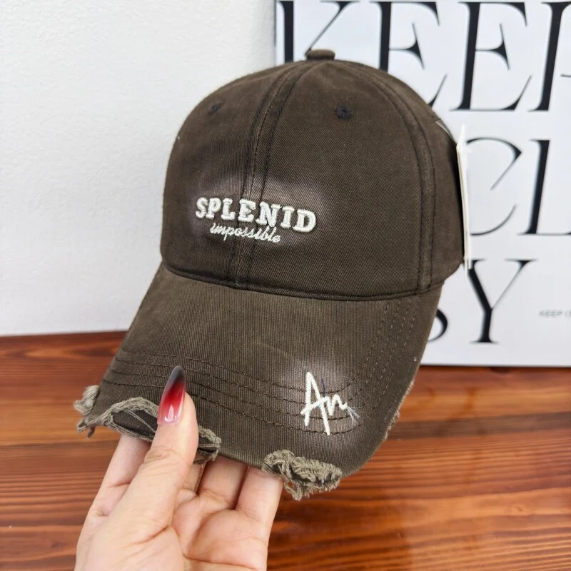 Damen Baseball Cap mit Grafik im Used-Look Skanto