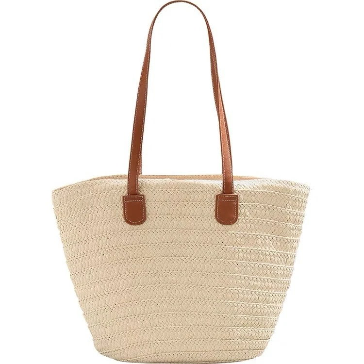 Stylische Strandtasche aus geflochtenem Naturmaterial mit Ledergriffen Skanto