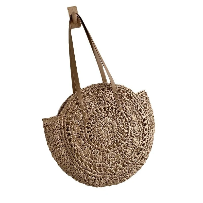 Runde geflochtene Strandtasche mit Ledergriff Skanto