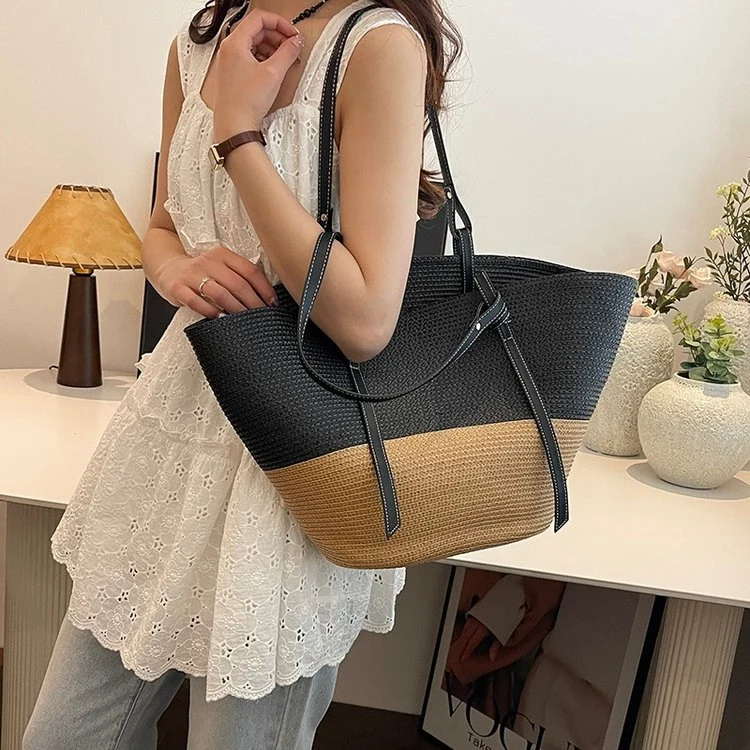 Elegante Strandtasche aus gewebtem Naturmaterial mit Lederdetails Skanto