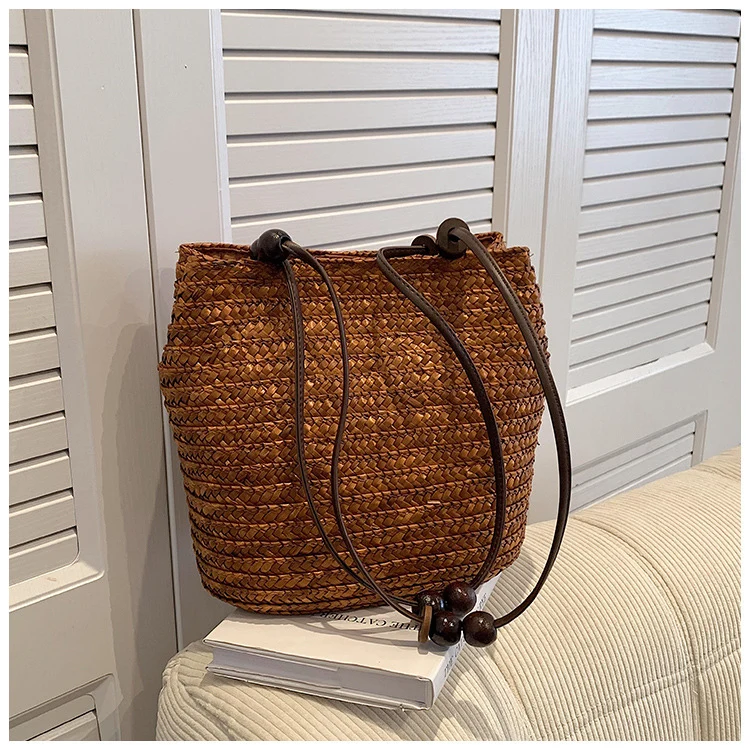 Elegante Korbtasche mit Lederdetails Skanto