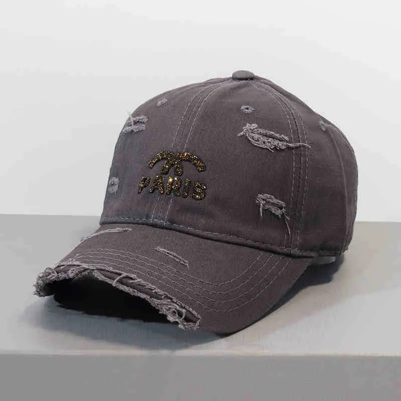 Damen Verstellbare Baseballkappe im Used-Look mit Grafik Skanto