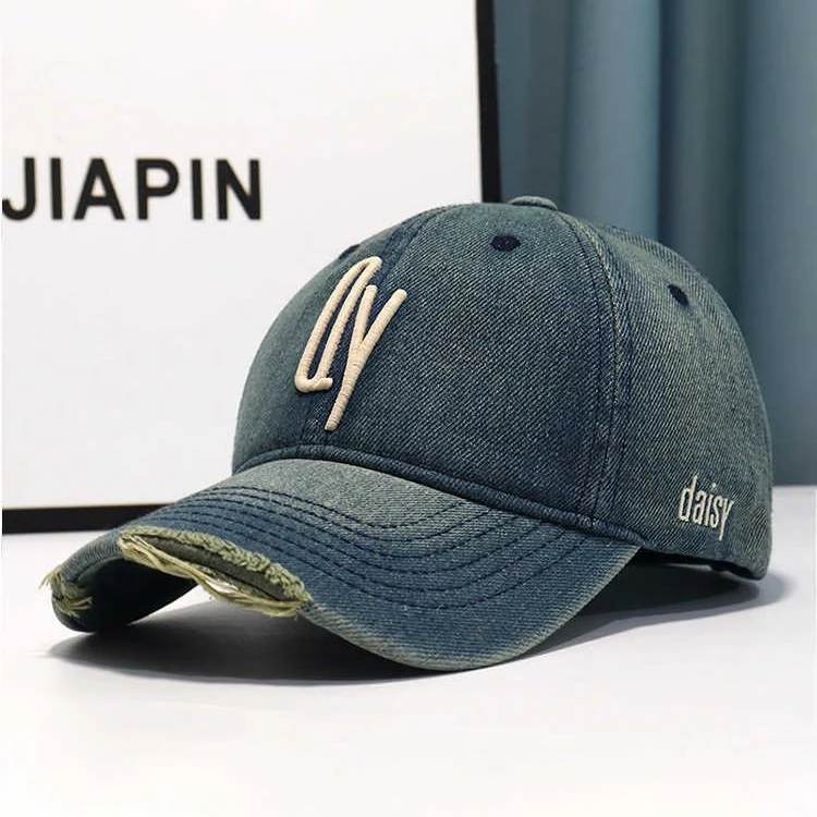 Damen Baseballkappe im Used-Look aus Jeans mit Stickerei Skanto