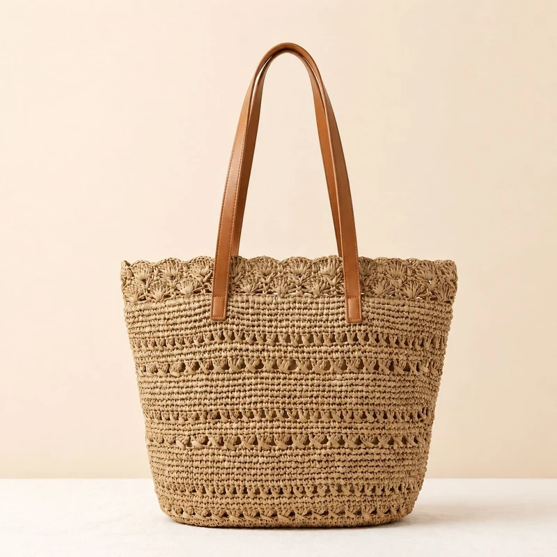 Strandtasche mit handgefertigtem Häkelmuster und Ledergriffen Skanto