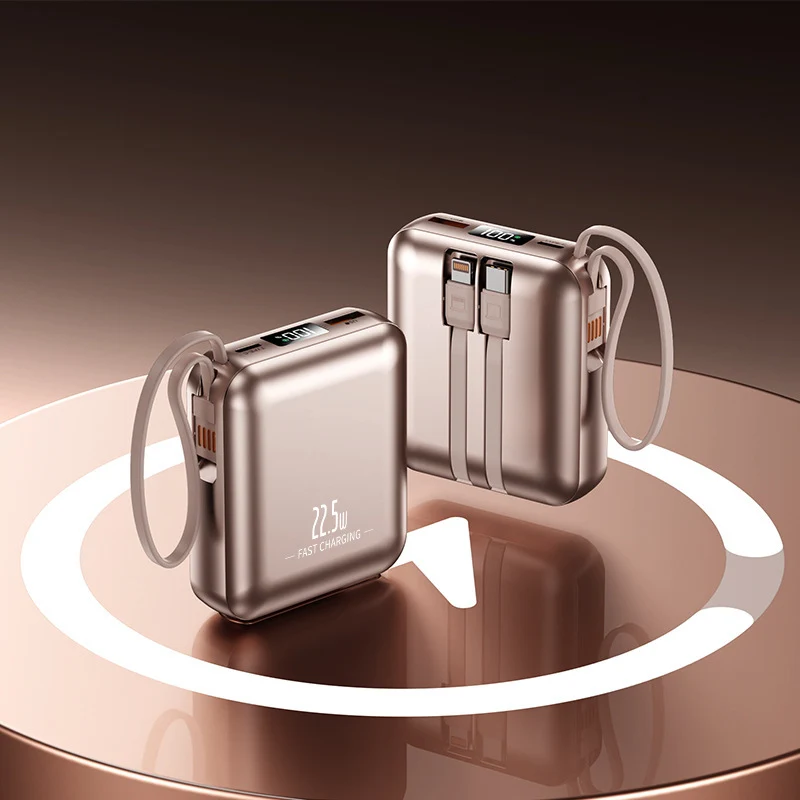 Tragbare Powerbank mit Schnellladefunktion und integriertem Kabelsystem Skanto